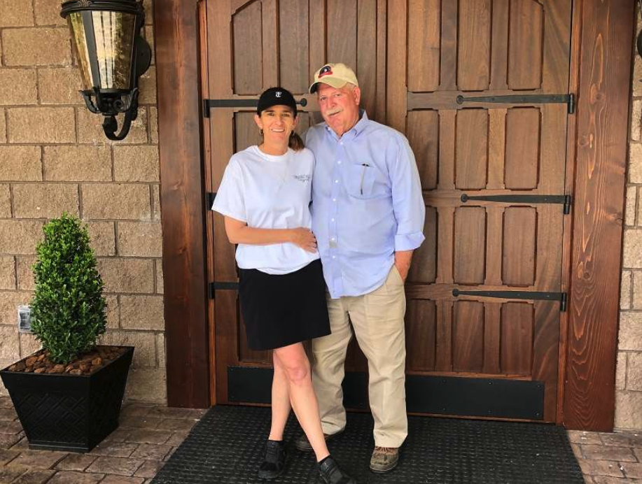 Larry and Sharon Holler at the entrance to Tunnel Creek Vineyards